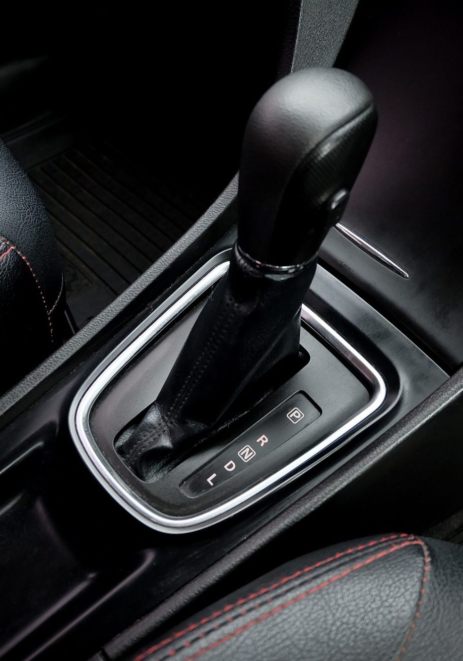 dreamstime_m_196745098 Automatic transmission shift selector in the car interior. Closeup a manual shift of modern car gear shifter. automatic transmission shift selector in the car interior. Closeup a manual shift of modern car gear shifter.