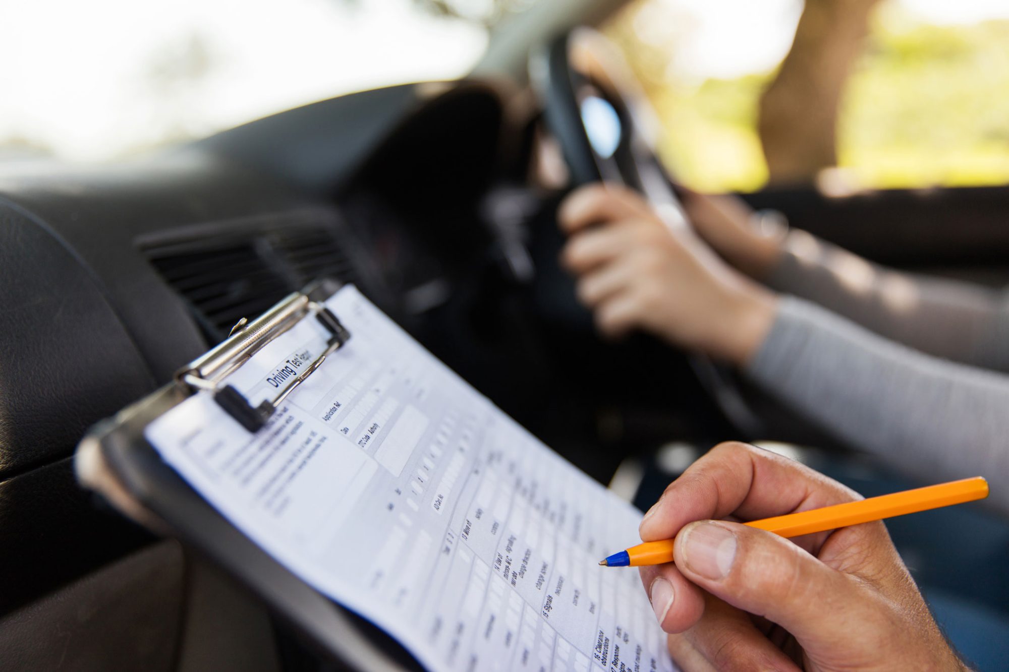 Student taking driving test. Student driver taking driving test